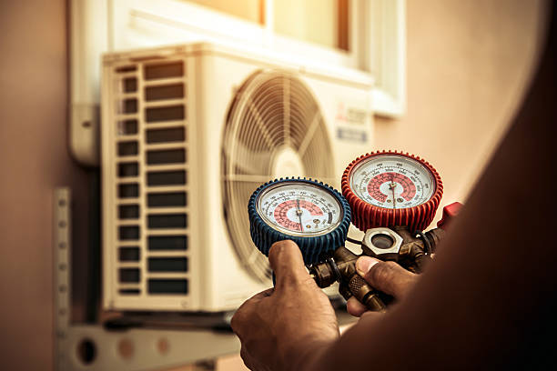 Professional Hvac technician working in Holladay, UT